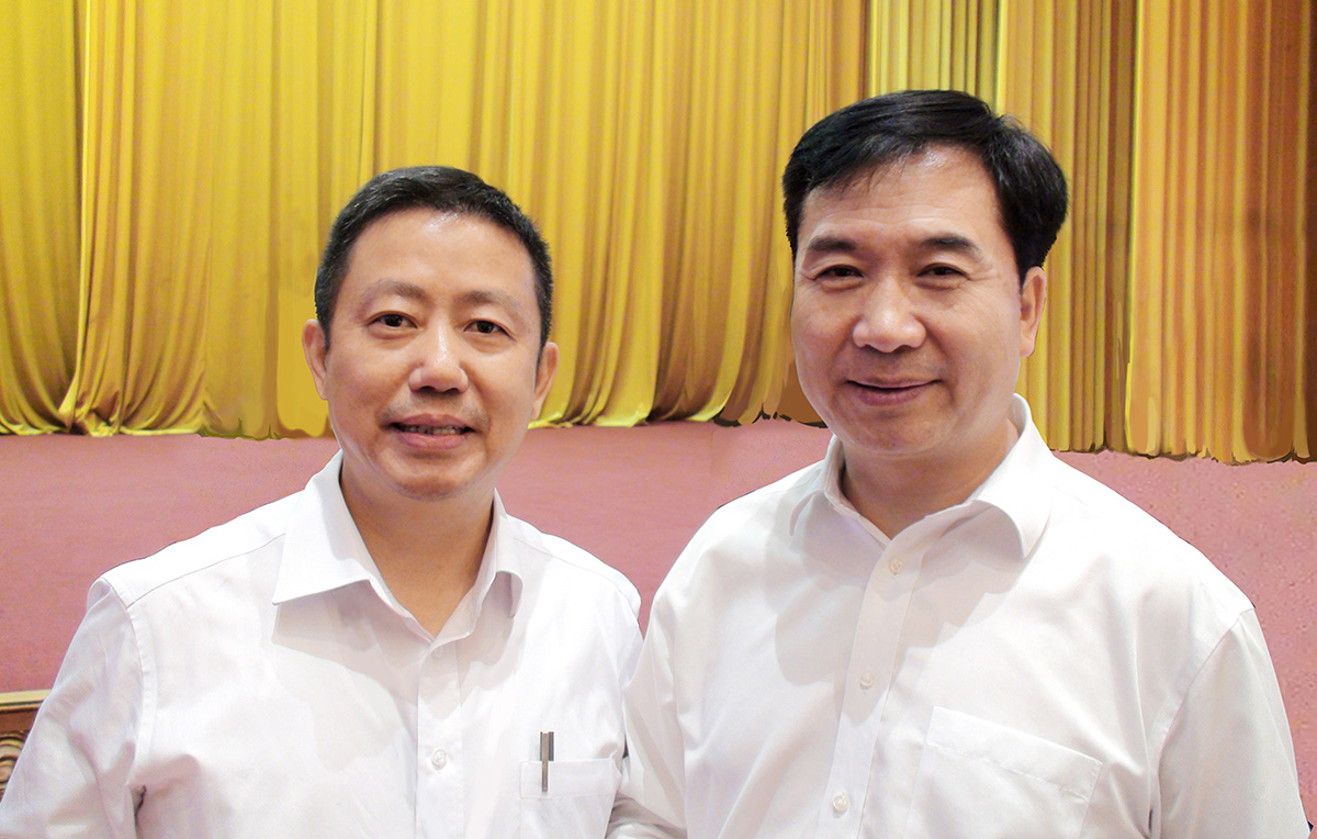 中央政治局常委、中央纪律检查委员会书记李希与周海江合影